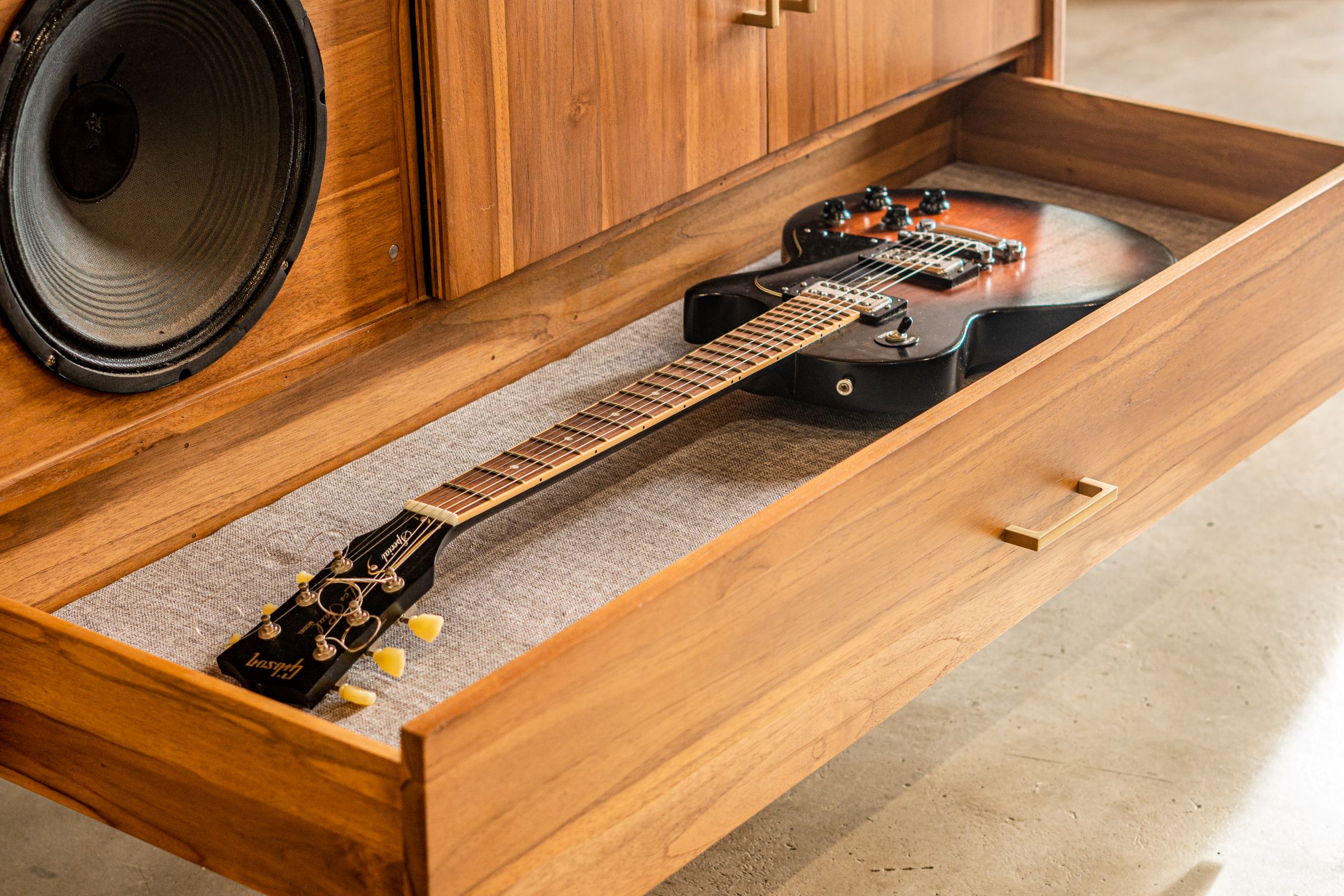 The Serenada incorporates guitar storage drawer