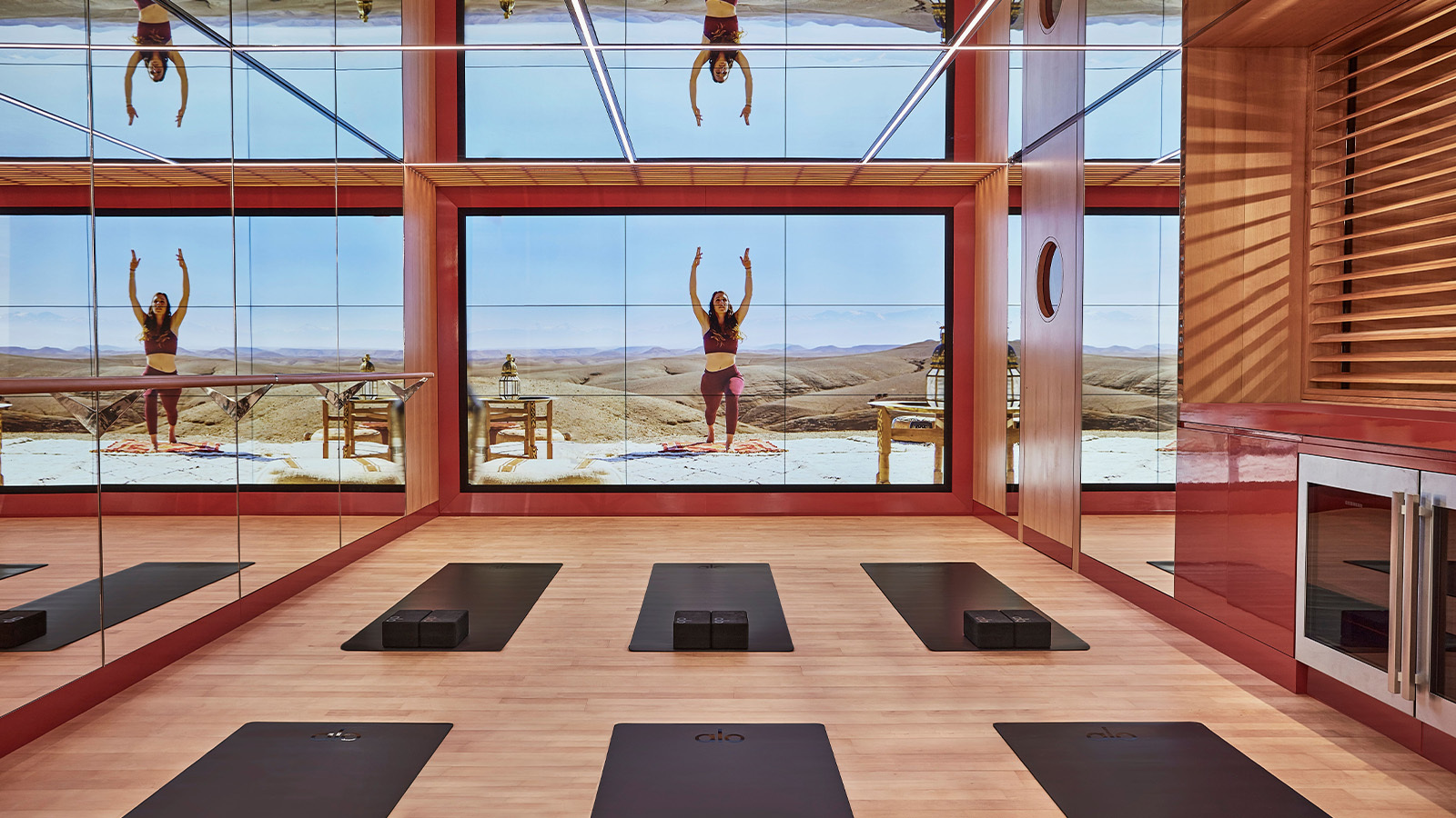 Person mid-air at Surenne studio, a luxury London gym
